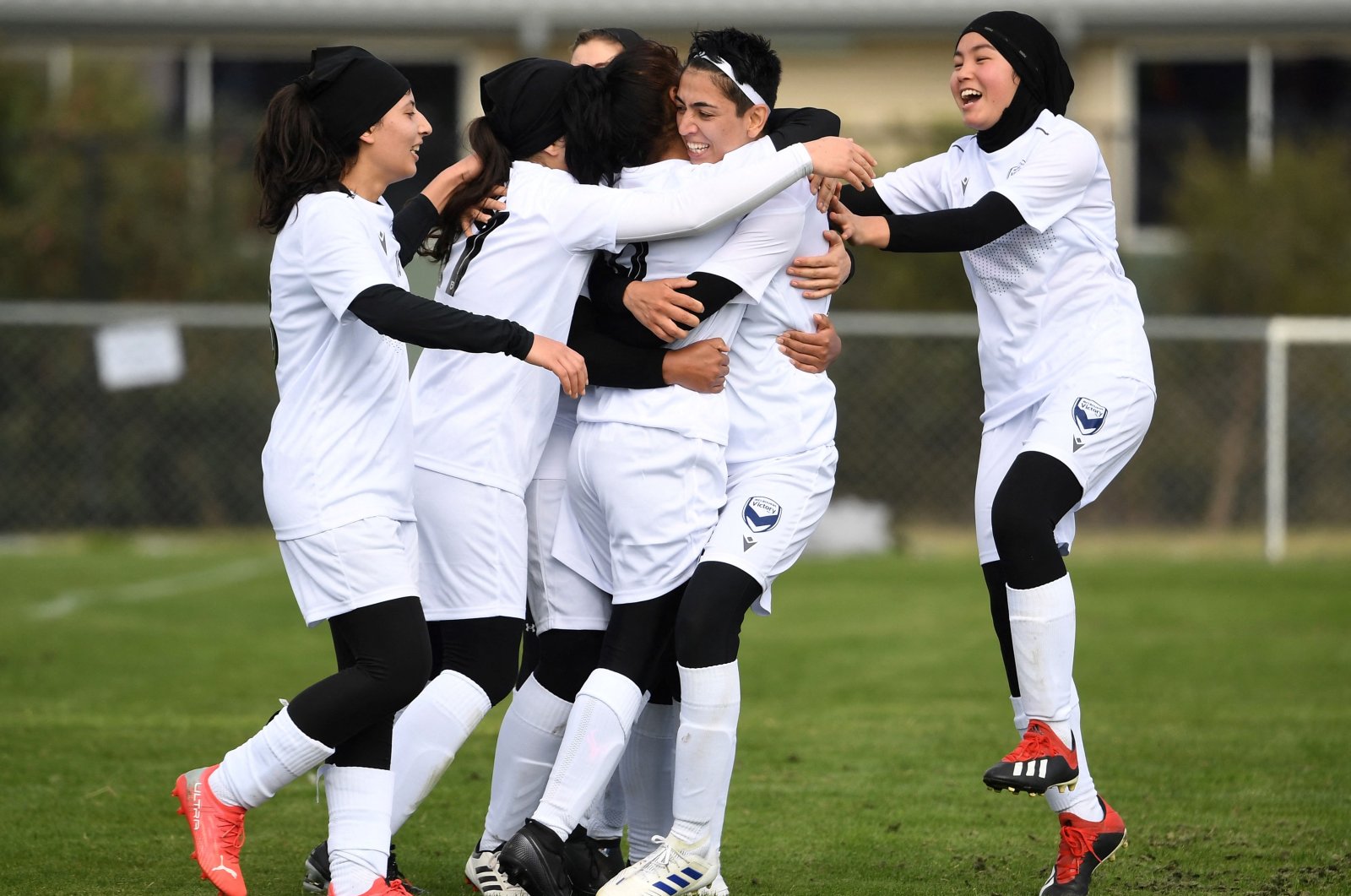 Melbourne Victory Afghan women&#039;s team players celebrate a goal, which was disallowed, during their first match in a local league, Melbourne, Australia, April 24, 2022. (AFP Photo)