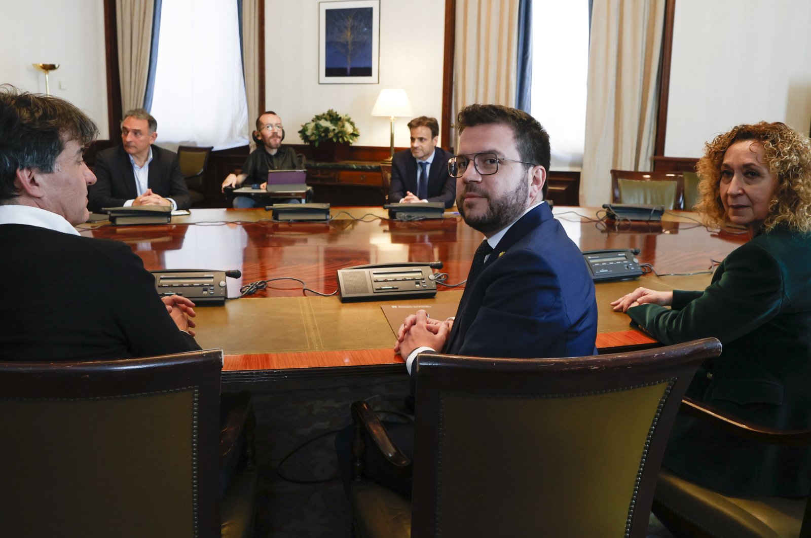 Catalonian regional President Pere Aragones (2-R) poses as he meets with several members of parliament at the Lower Chamber of Spanish Parliament, Madrid, Spain, April 21, 2022. (EPA Photo)
