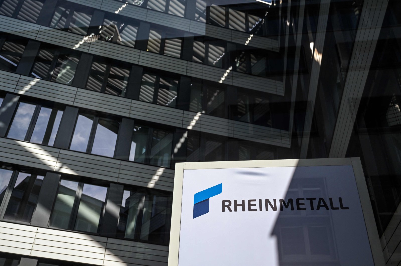 The logo of German defense company and automotive supplier Rheinmetall is seen at their headquarters in Duesseldorf, western Germany, April 21, 2022. (AFP Photo)