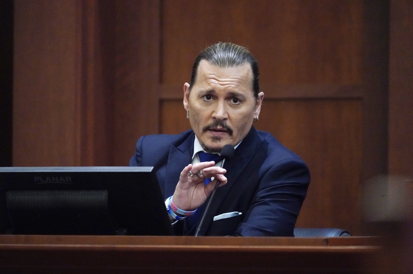 U.S. actor Johnny Depp testifies in the courtroom at the Fairfax County Circuit Courthouse in Fairfax, Virginia, U.S., April 25, 2022. (EPA)