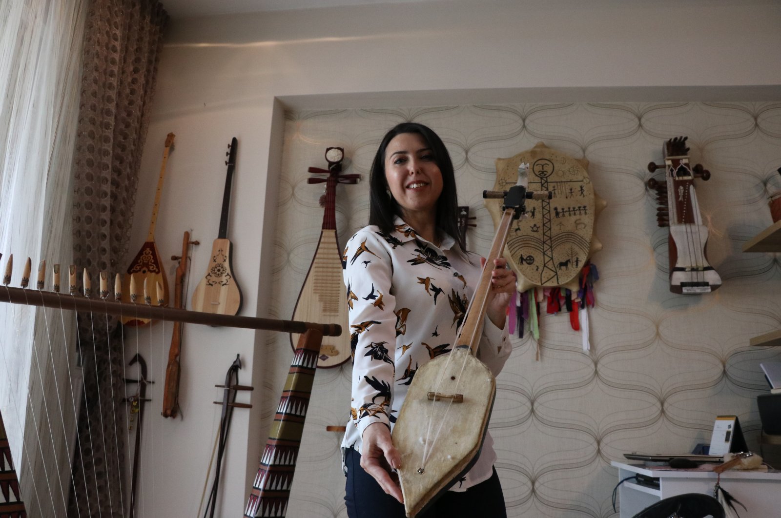Professor Feyzan Göher has amassed a collection of 200 musical instruments from 30 countries in 22 years, Niğde,Turkey, April 26, 2022. (AA Photo)