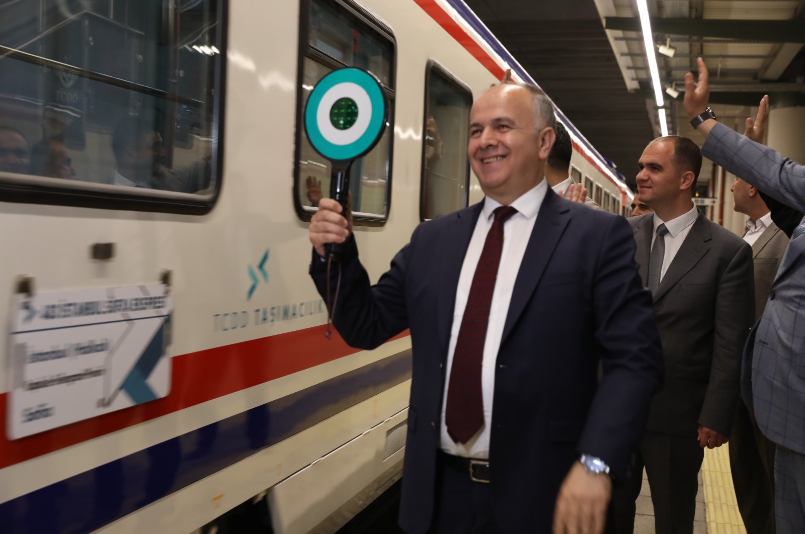 TCDD Transportation General Manager Hasan Pezük bids farewell to the train operating on the Istanbul-Sofia route in Istanbul, Turkey, April 26, 2022. (AA Photo)