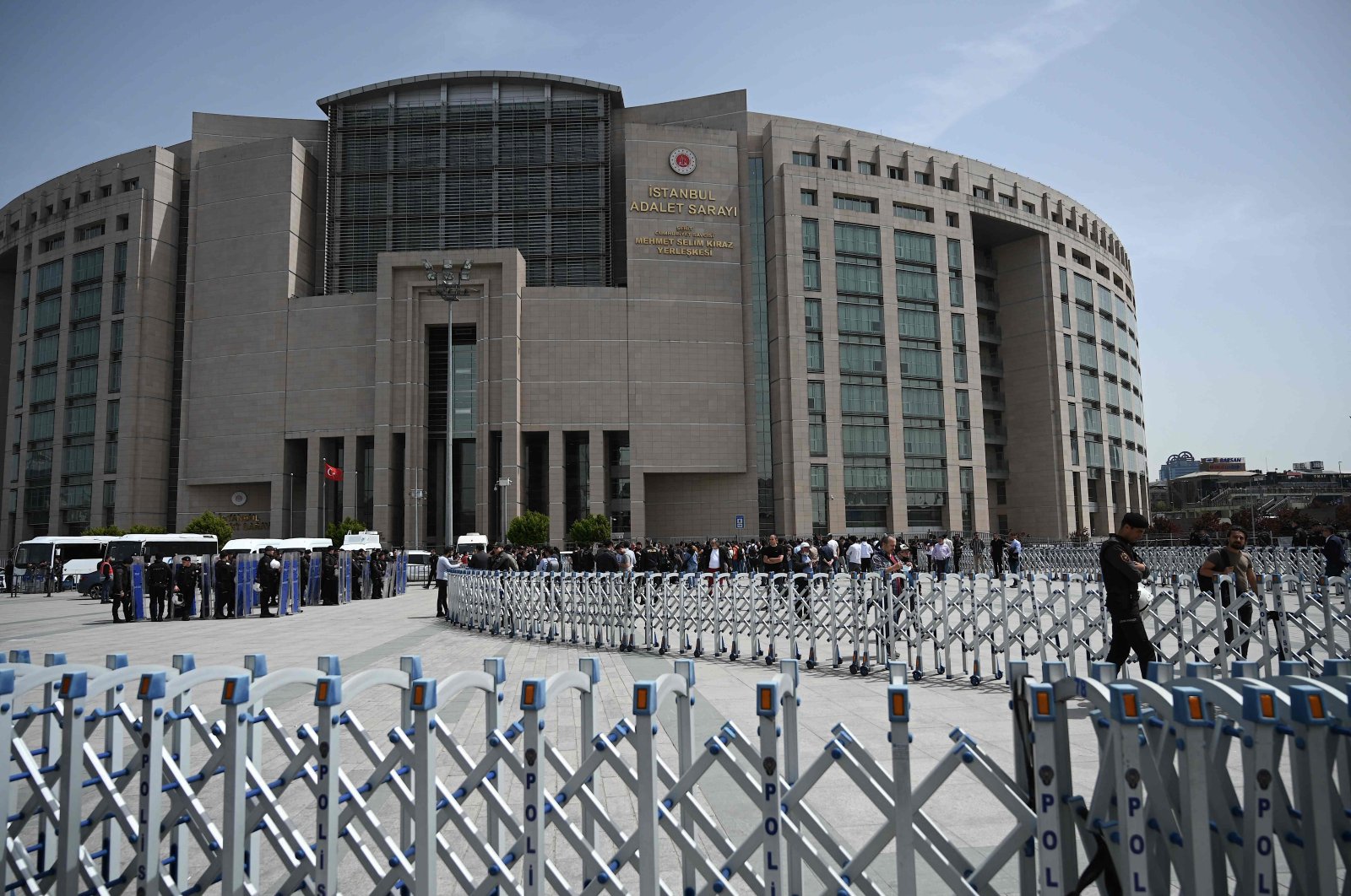 Turkish anti-riot police stand outside the Istanbul courthouse during a protest against a Turkish court decision to sentence Osman Kavala to lifetime prison, in Istanbul on April 26, 2022. (AFP)