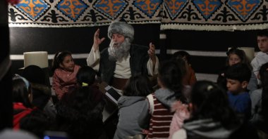 Actor Hasan Demirci tells stories about Ramadan to children, in Istanbul, Turkey, April 26, 2022. (AA Photo)