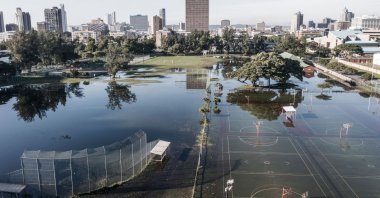 An aerial view shows sports fields under water days after heavy rains and "unprecedented" floods wreaked havoc in Durban, South Africa, April 15, 2022. (AFP Photo)