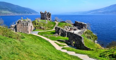 Ruins of Urquhart Castle along Loch Ness, Scotland. (Shutterstock Photo)