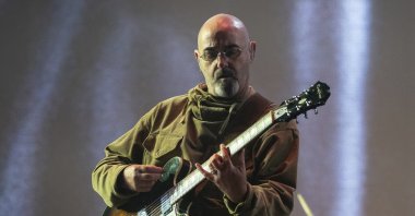 Paul Arthurs performs at the Reading Music Festival, England, Aug. 29, 2021. (AP Photo)