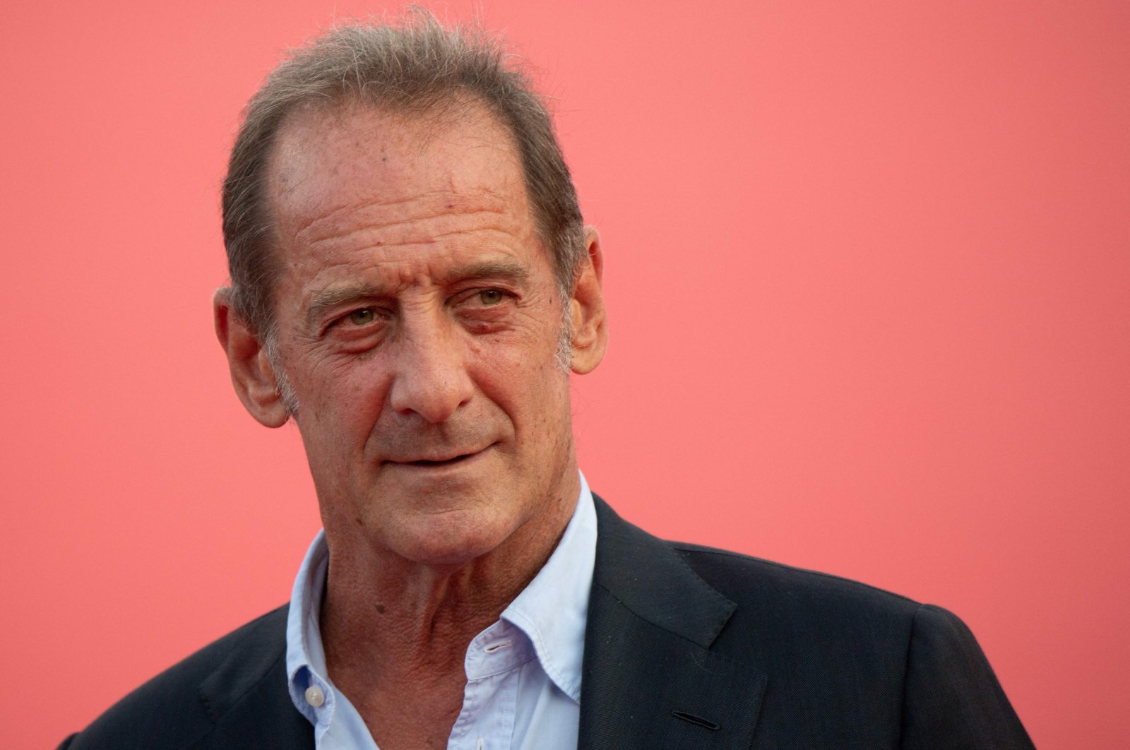 French actor Vincent Lindon poses as he arrives on the red carpet during the 47th Deauville American Film Festival in Deauville, western France, Sept. 4, 2021. (AFP)