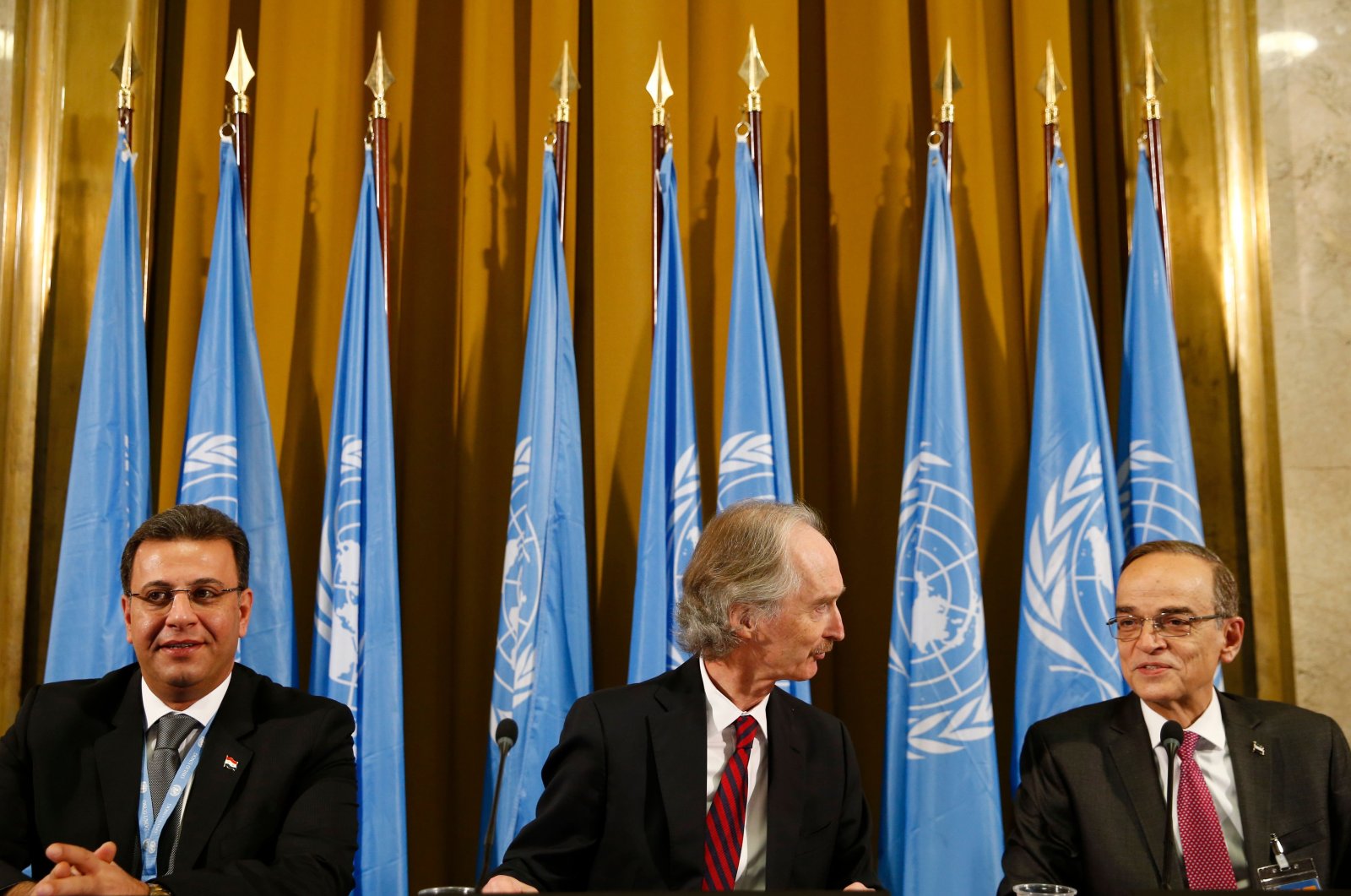 U.N. Special Envoy to Syria Geir Pedersen (C), co-Chair Syrian MP Ahmad al-Kuzbari (L) and co-Chair of the opposition Syrian Negotiations Commission Hadi al-Bahra attend a ceremony to mark the opening of a meeting of the Syria constitution-writing committee at the United Nations Offices in Geneva, Switzerland, Oct. 30, 2019. (AFP Photo)