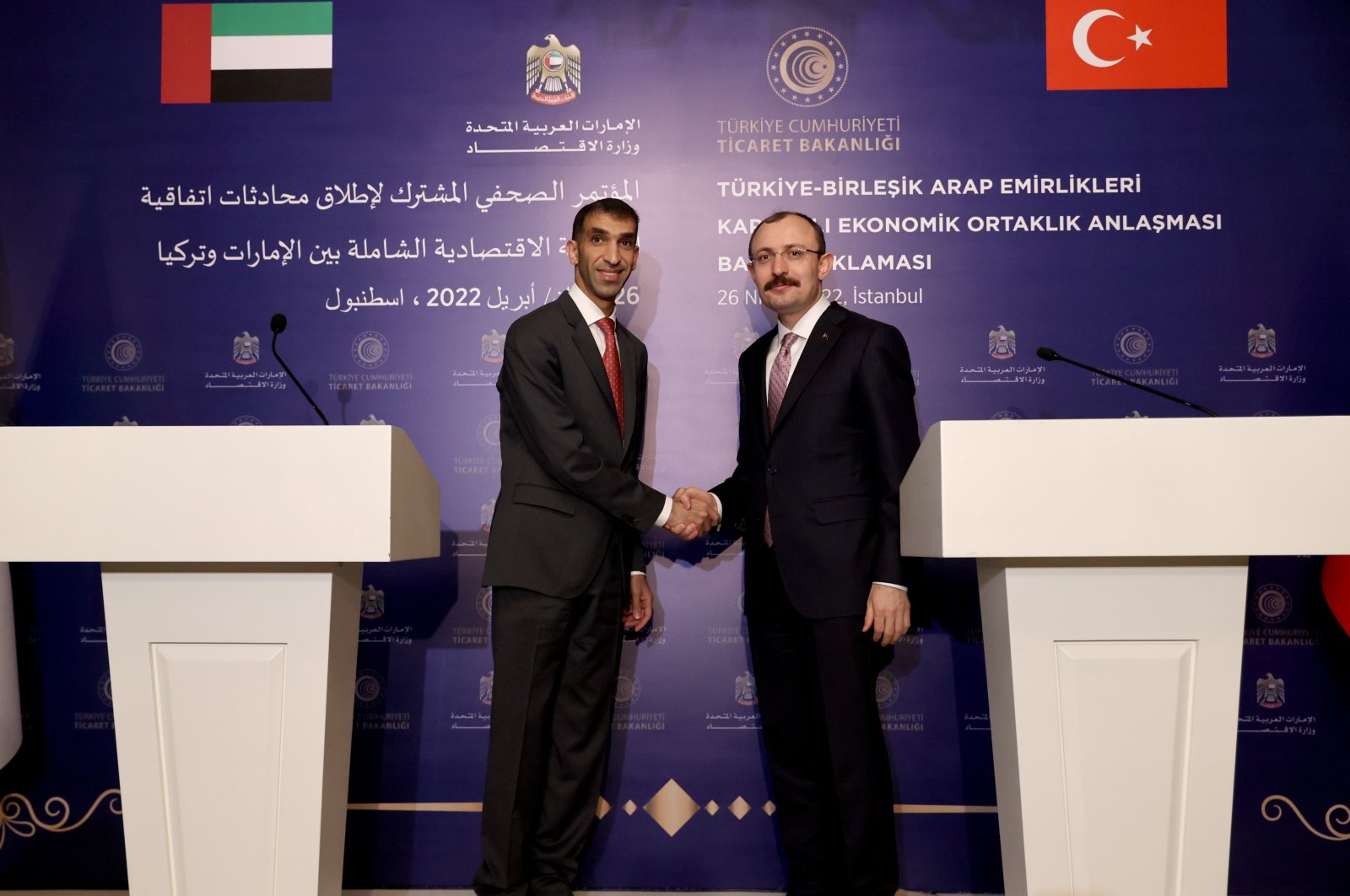 Trade Minister Mehmet Muş (R) and Emirati Minister of State for Foreign Trade Thani al-Zeyoudi shake hands after a joint press conference in Istanbul, Turkey, April 26, 2022. (AA Photo)