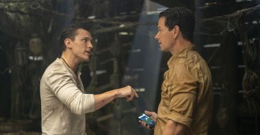 Mark Wahlberg (R) and Tom Holland, in a scene from the film &quot;Uncharted.&quot; (AP Photo)