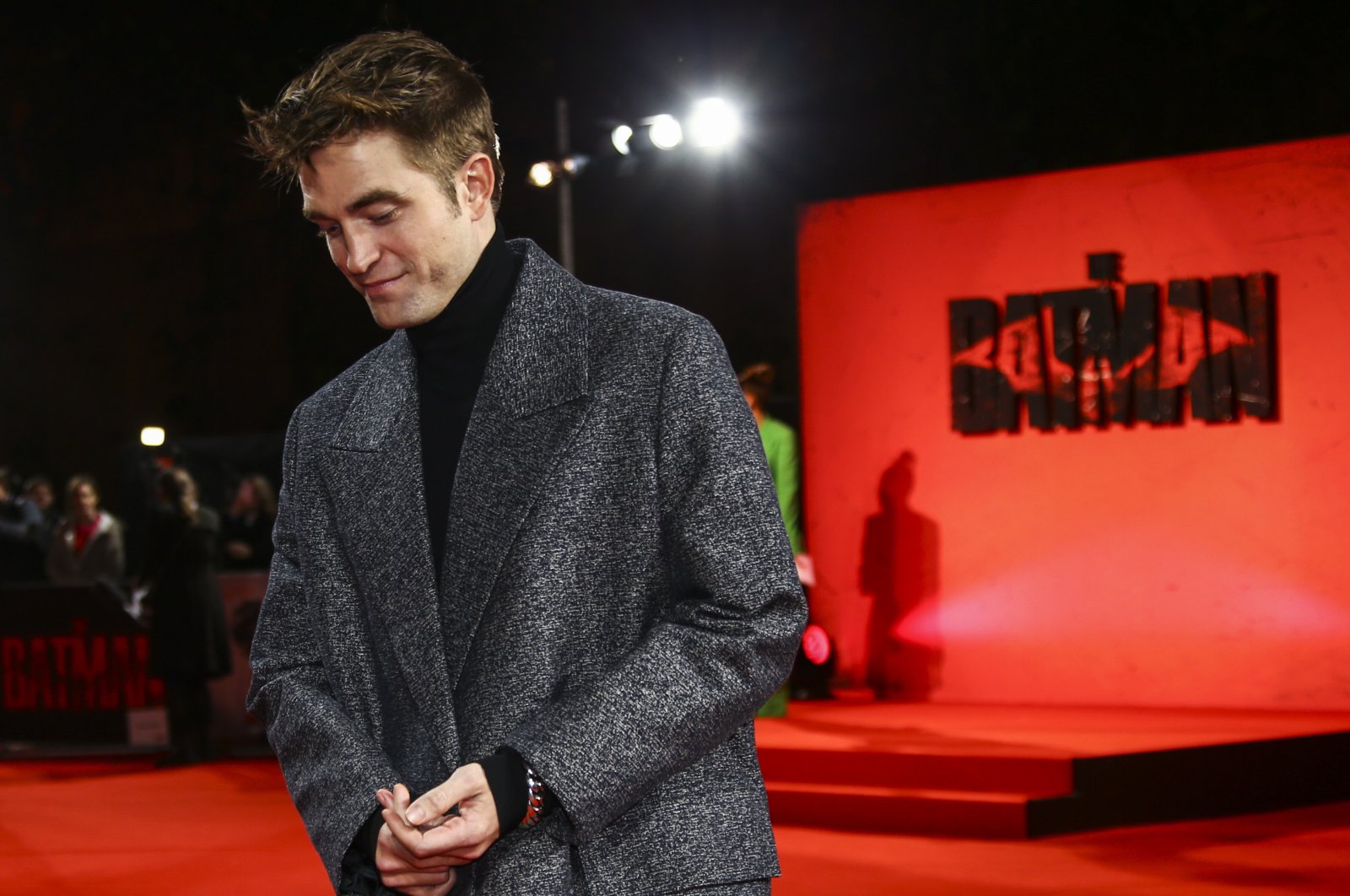 Robert Pattinson poses for photographers before the screening of &quot;The Batman&quot; in London, U.K., Feb. 23, 2022. (AP Photo)
