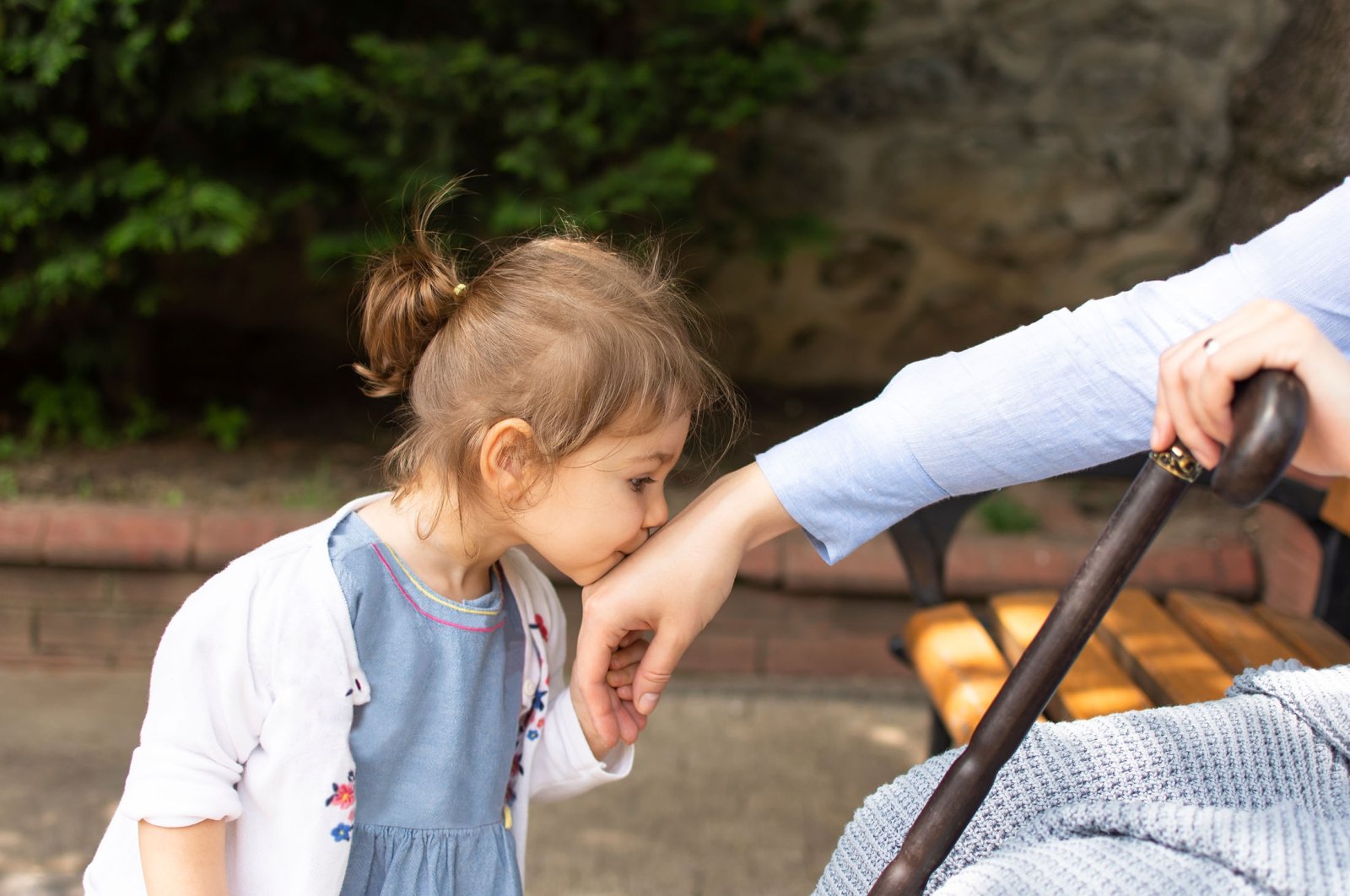 Children kissing their elders hand – and receiving some allowance – is one of the biggest traditions of Ramadan Bayram. (Shutterstock Photo)