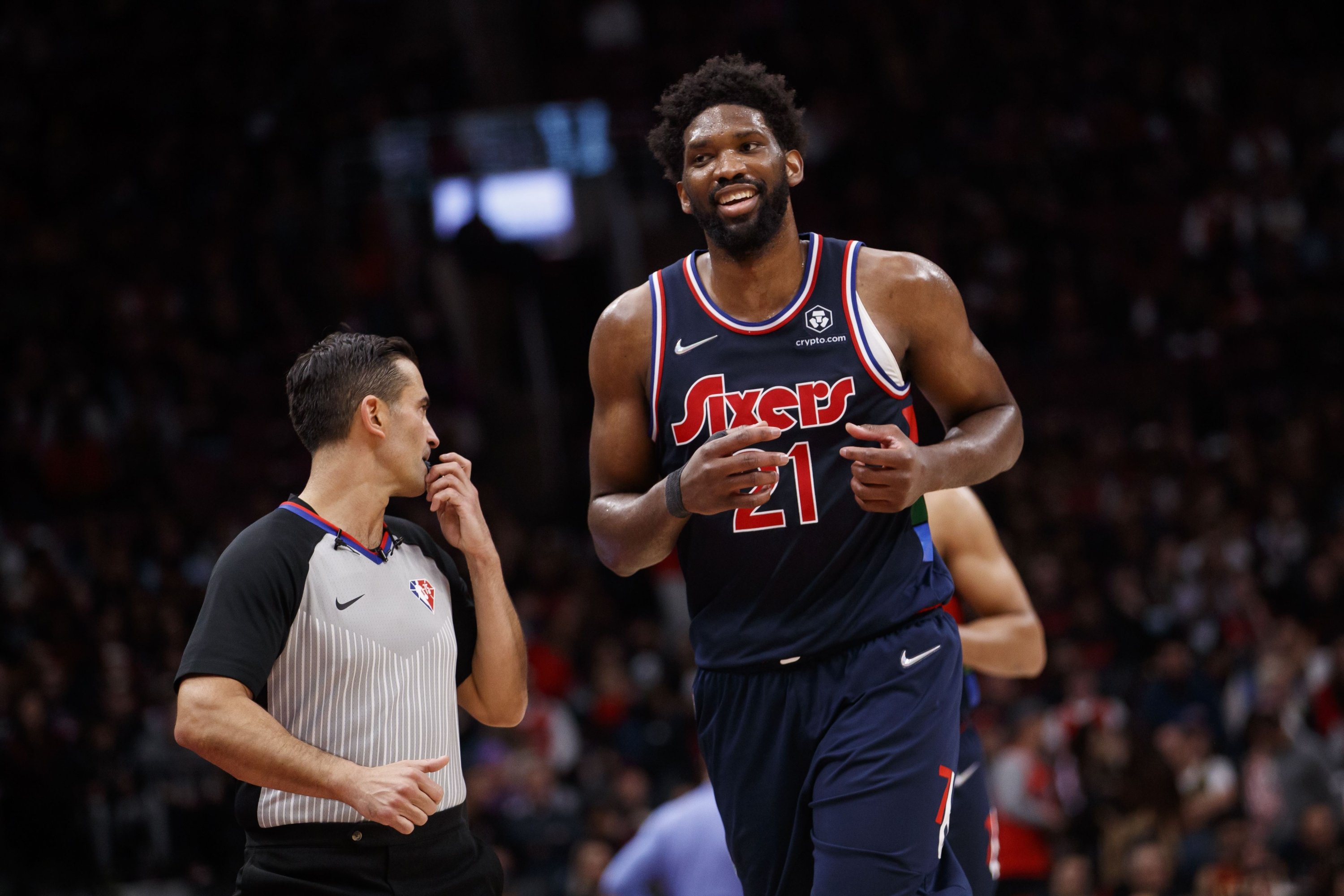 Sixers' Joel Embiid smiles during an NBA playoffs game against the Toronto Raptors, Toronto, Canada, April 28, 2022.