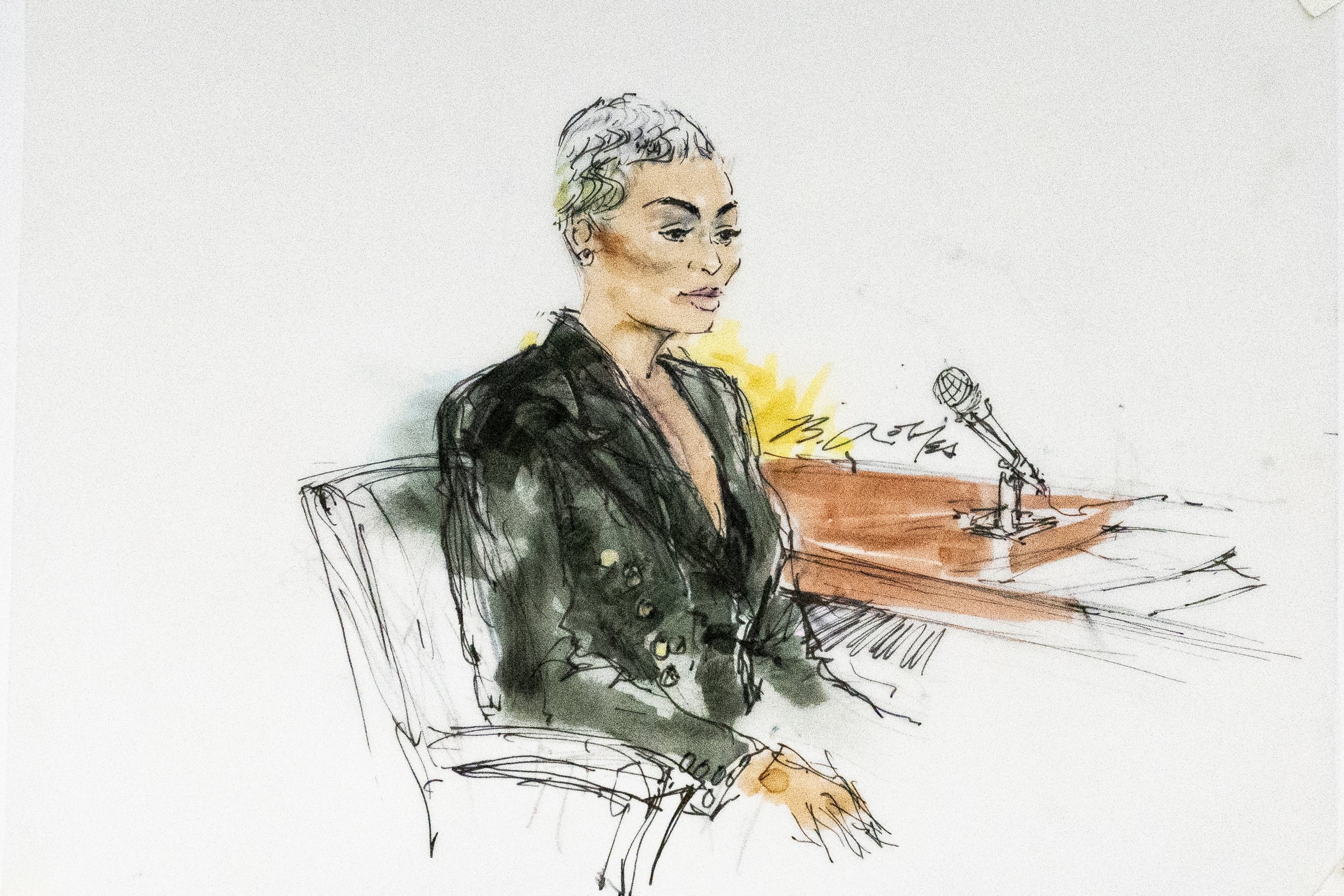 Dans ce croquis d'artiste de la salle d'audience, l'ancienne star de la télé-réalité Blac Chyna siège au tribunal de Los Angeles, États-Unis, le 19 avril 2022. (AP Photo)