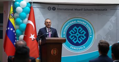 Foreign Minister Mevlüt Çavuşoğlu speaks during the inauguration ceremony of a Maarif school in Caracas, Venezuela, April 28, 2022. (AA)