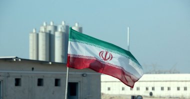 An Iranian flag in Iran&#039;s Bushehr nuclear power plant, during an official ceremony to kick-start works on a second reactor at the facility, Nov. 10, 2019. (AFP Photo)