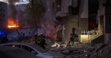 Emergency services respond in the area following an explosion in Kyiv, Ukraine on Thursday, April 28, 2022. (AP Photo)