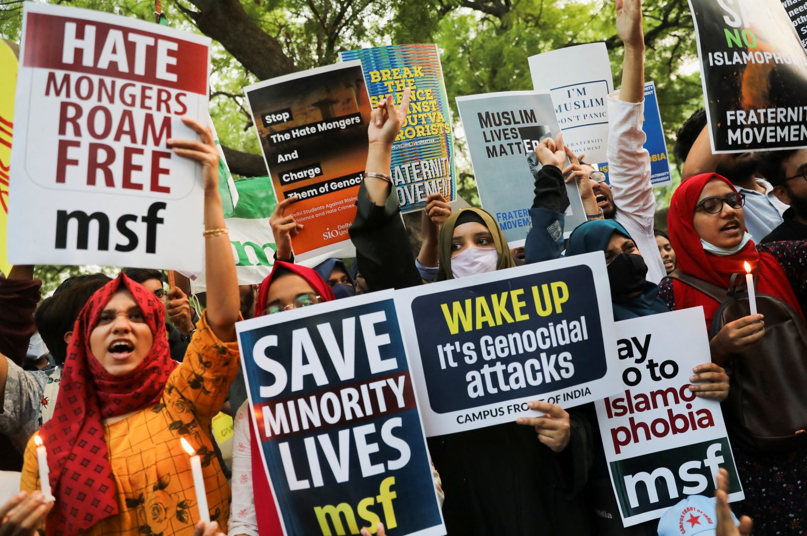 Citizens shout slogans and hold placards during a peace vigil organized by citizens against hate crimes and violence against Muslims, New Delhi, India, April 16, 2022. (Reuters Photo)