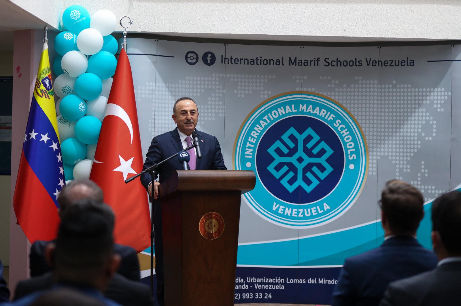 Foreign Minister Mevlüt Çavuşoğlu speaks during the inauguration ceremony of a Maarif school in Caracas, Venezuela, April 28, 2022. (AA)