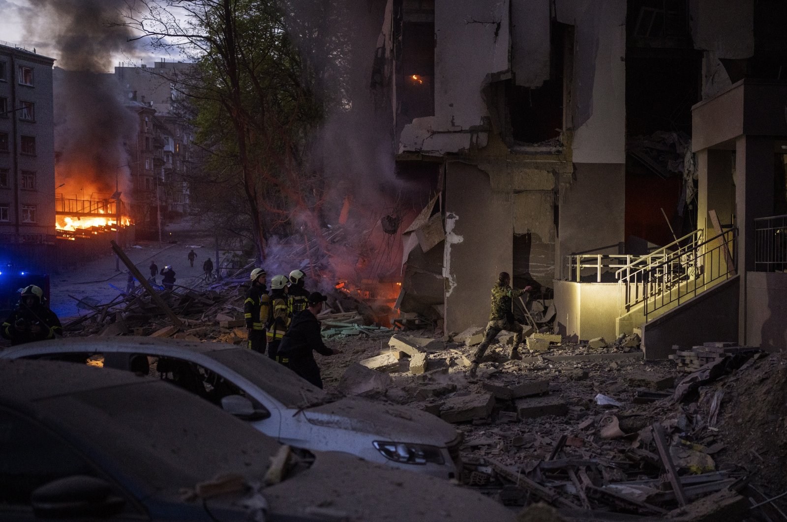 Emergency services respond in the area following an explosion in Kyiv, Ukraine on Thursday, April 28, 2022. (AP Photo)