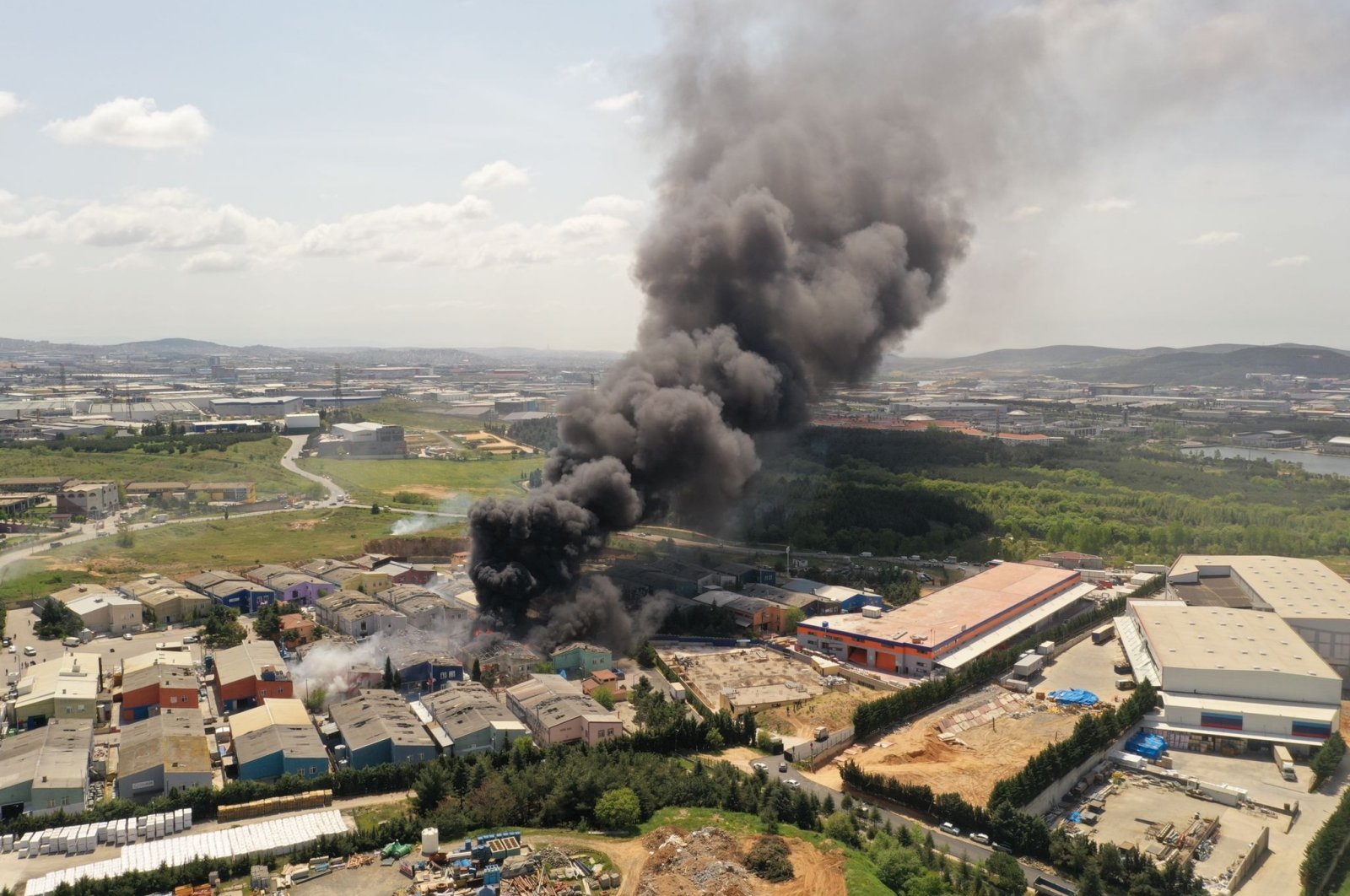 An aerial view of the factory with black smoke rising, in Istanbul, Turkey, April 29, 2022. (İHA PHOTO)
