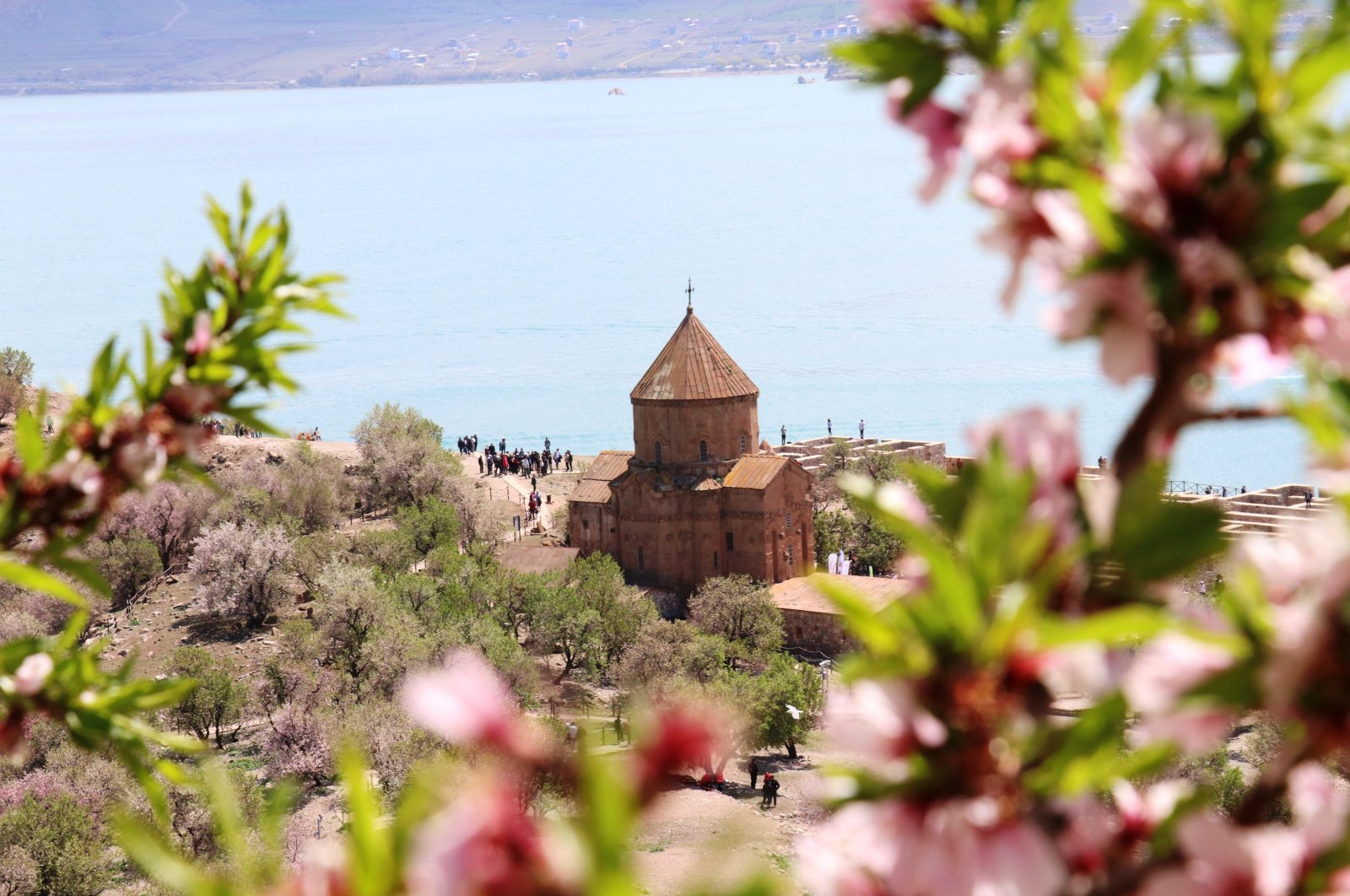 Organized by the Van Culture and Tourism Provincial Directorate on Akdamar Island in the Gevaş district of Van, the &quot;First Almond Blossom Festival&quot; was the scene of colorful images, Van, Turkey, April 28, 2022. (IHA Photo)