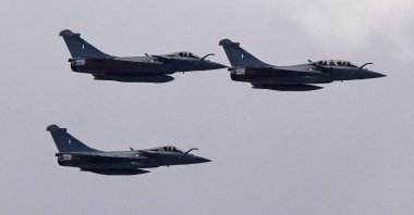 Three Rafale jet fighters flying over the city of Athens, Greece, Jan. 19, 2022. (AFP Photo)