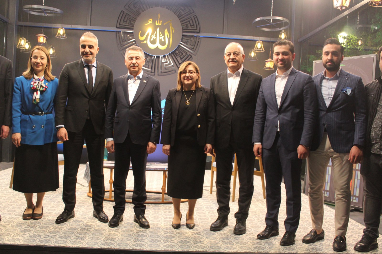 Turkish Vice President Fuat Oktay (3rd-L) with relatives of martyrs and veterans at an iftar program in Gaziantep, southeastern Turkey, April, 29, 2022. (IHA Photo)