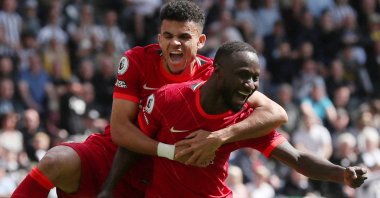 Liverpool's Naby Keita (R) celebrates with teammate Luis Diaz after scoring in a Premier League game against Newcastle United, Newcastle, England, April 30, 2022. (Reuters Photo)
