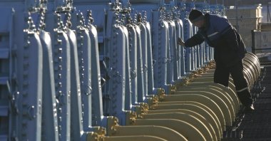 A Belarusian worker on duty at a gas compressor station of the Yamal-Europe pipeline near Nesvizh, some 130 km (81 miles) southwest of the capital Minsk, Belarus, Dec. 29, 2006. (AP Photo)

