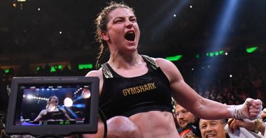 Katie Taylor (C) celebrates beating Amanda Serrano for the World Lightweight Title, New York City, U.S., April 30, 2022. (AFP Photo)