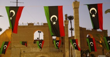 Libyan flags are displayed as people celebrate the February Revolution Day in Martyrs' Square in Tripoli, Libya, Feb. 18, 2022.  (AP File Photo)