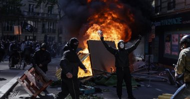Demonstrators clash with police forces during the annual May Day demonstration in Paris, France, May 1, 2022. (EPA Photo)