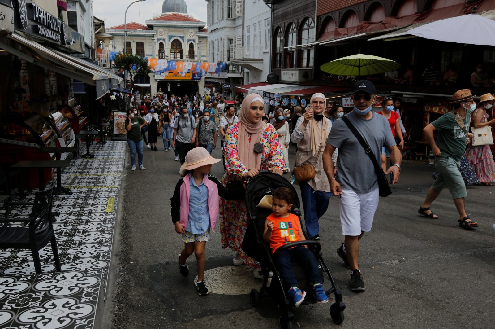 Foreign tourists visit Büyükada, the largest of the Princes&#039; Islands in the Marmara Sea, off Istanbul, Turkey July 14, 2021. (Reuters Photo)
