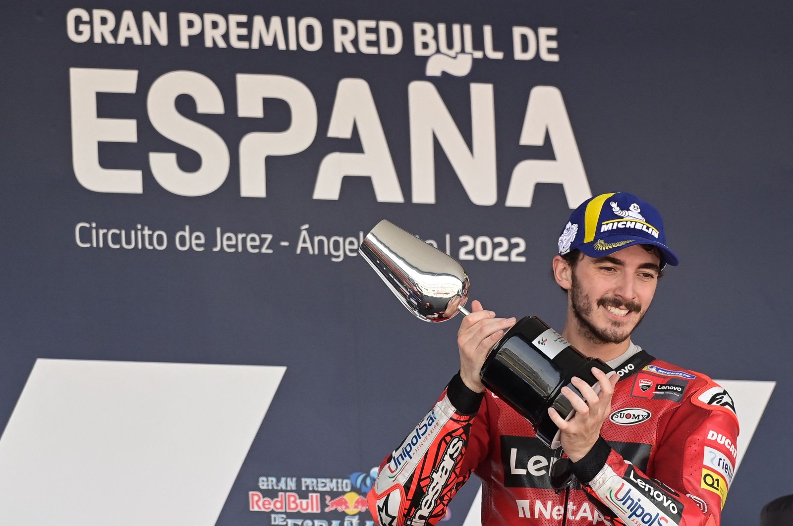 Ducati Italian rider Francesco Bagnaia celebrates on the podium after winning the MotoGP race of the Spanish Grand Prix at the Jerez racetrack, Jerez de la Frontera, Spain, May 1, 2022. (AFP Photo)