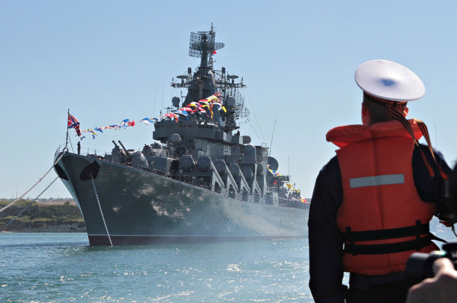 A sailor looks at the Russian missile cruiser Moskva moored in the Ukrainian Black Sea port of Sevastopol, Ukraine, 2013. (Reuters File Photo)
