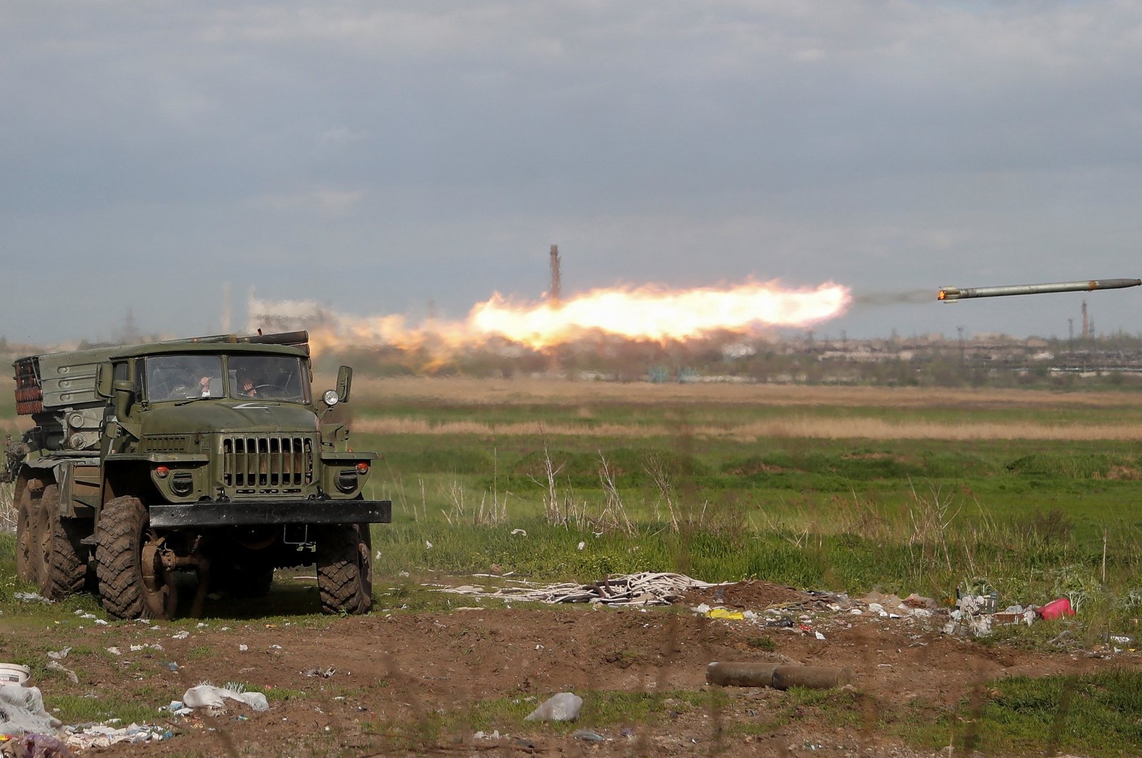 Service members of pro-Russian troops fire a BM-21 Grad multiple rocket launch system during fighting near the Azovstal Iron and Steel Works in the southern port city of Mariupol, Ukraine May 2, 2022. (Reuters Photo)