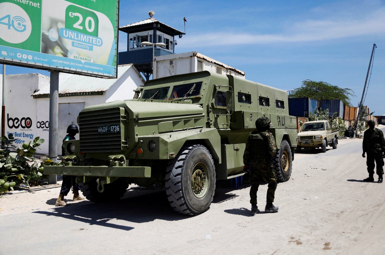 African Union peacekeepers stand next to an armored personnel carrier (APC) as they provide security for members of the Lower House of Parliament who are meeting to elect a speaker, at the Aden Adde International Airport in Mogadishu, Somalia, April 27, 2022. (Reuters File Photo)