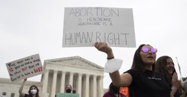 Abortion rights advocates hold signs outside the Supreme Court in Washington, D.C., U,S., May 4, 2022. (EPA Photo)