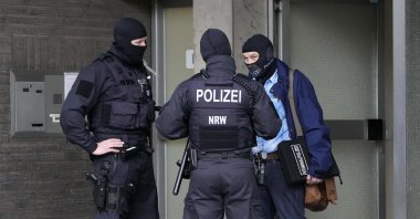 Police investigate in Duesseldorf, Germany, as part of raids in several German cities, Wednesday, Oct. 6, 2021. (AP File Photo)
