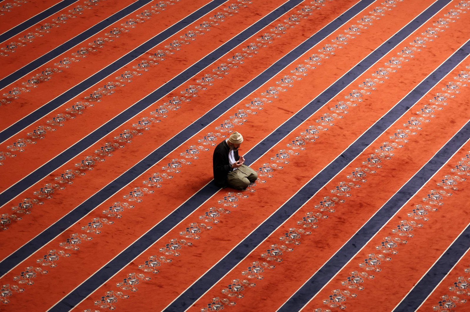 A Muslim during the Eid al-Fitr, or Ramadan Bayram, prayers at Kocatepe Mosque, in the capital Ankara, Turkey, May 2, 2022. (AFP Photo)