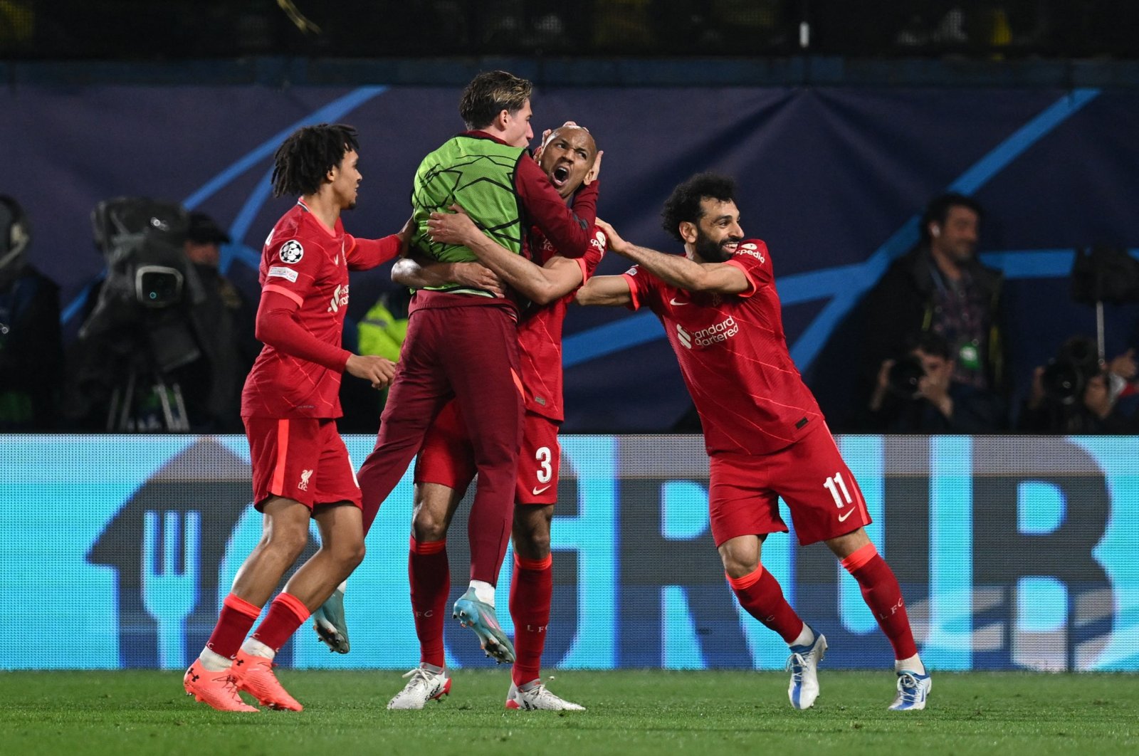 Liverpool players celebrate a goal in a Champions League semi against Villarreal CF, Vila-real, Spain, May 3, 2022. (AFP Photo)