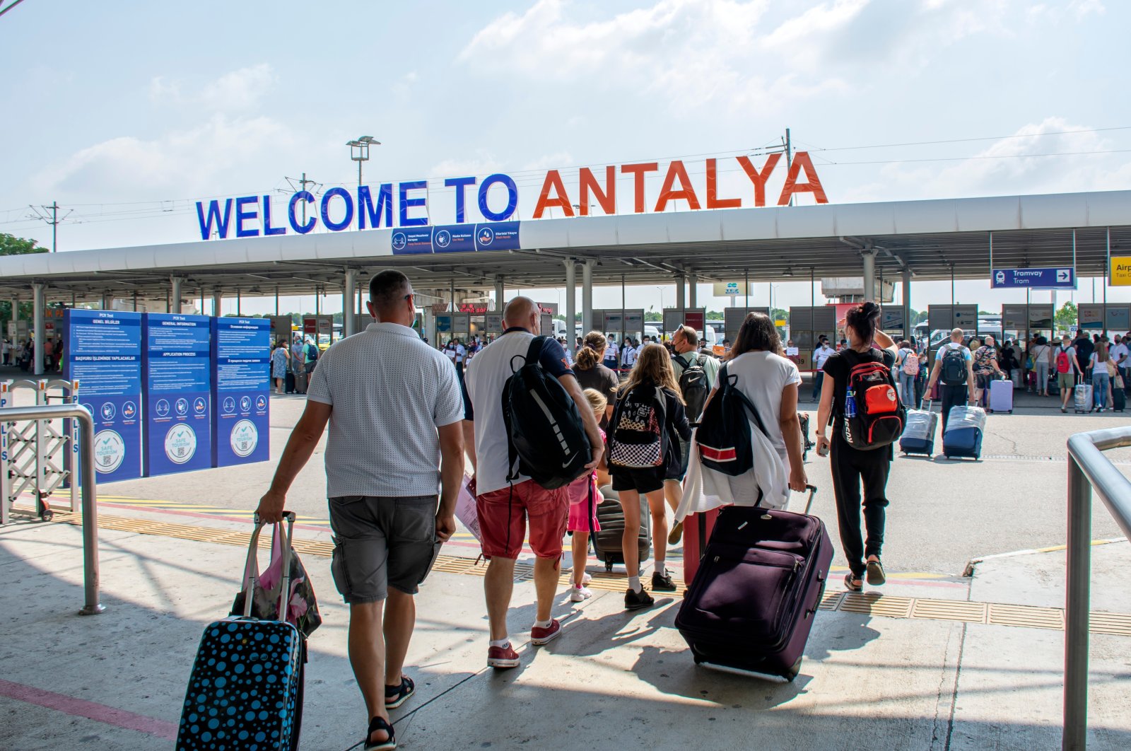Tourists arrive at an airport in Antalya, one of the most popular tourist destinations in the Mediterranean, Turkey, May 1, 2022. (IHA Photo)