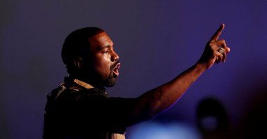 Rapper Kanye West gestures to the crowd as he holds his first rally in support of his presidential bid in North Charleston, South Carolina, U.S., July 19, 2020. (REUTERS Photo)