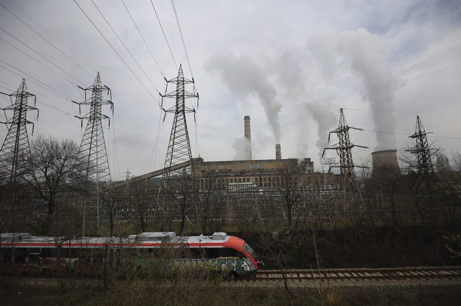 A train passes by Republika Power Plant in the town of Pernik, Bulgaria, April 21, 2022. The only nuclear power plant, generating over a third of Bulgaria’s electricity, runs on uranium from Russia. (AP Photo)