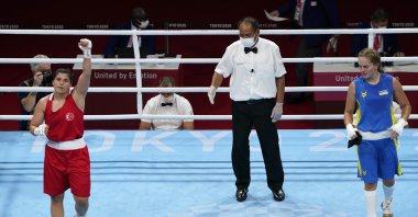 Busenaz Sürmeneli (L), one of the competitors in the Istanbul tournament, reacts after a match in Tokyo, Japan, July 30, 2021. (AP Photo)