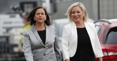 Sinn Fein leader Mary Lou McDonald, left, and Deputy leader Michelle O'Neill arrive at the election count center in Belfast, Northern Ireland Counting is continuing across Northern Ireland in the Assembly elections. (AP Photo)
