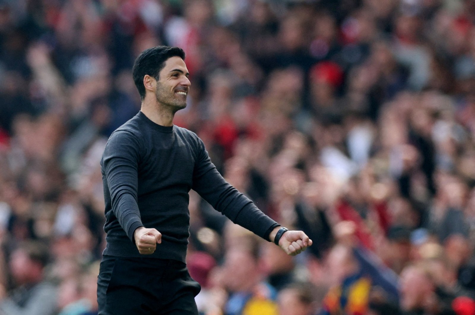 Mikel Arteta celebrates after the match against Manchester United, in London, Britain, April 23, 2022. (REUTERS PHOTO)