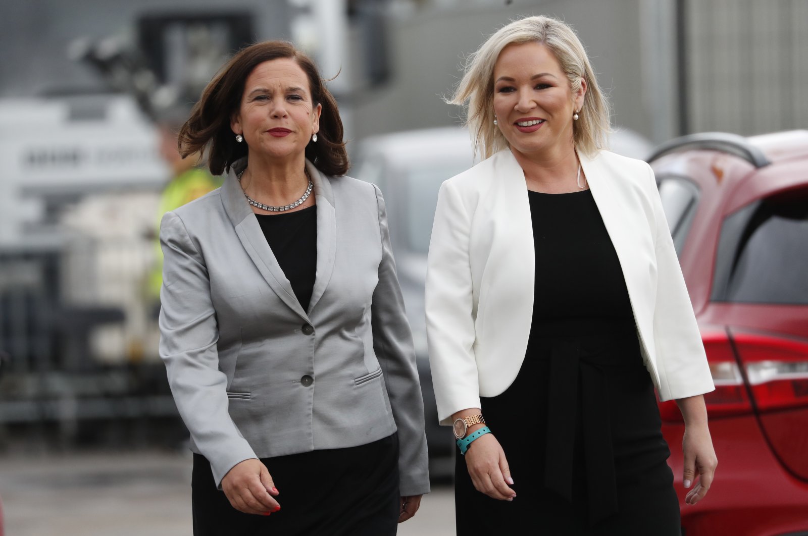 Sinn Fein leader Mary Lou McDonald, left, and Deputy leader Michelle O&#039;Neill arrive at the election count center in Belfast, Northern Ireland Counting is continuing across Northern Ireland in the Assembly elections. (AP Photo)